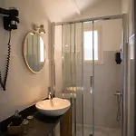 - Restaurant U Santu Petru Hotel *