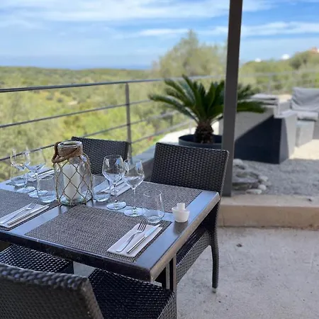 - Restaurant U Santu Petru Hotel *